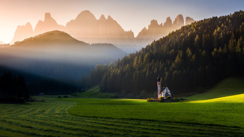 Light from above / Svetlo zhoraThe picture "Light from above" was taken in September 2016 in Santa Maddalena, Dolomiten, Italy. Beautiful light and humidity stood behind the nice play of light and shadows that morning. I was waiting as the small church was illuminated by the very first rays of Sun.&nbsp;